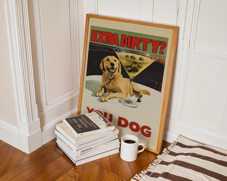 May include: A vintage-style poster with a golden retriever dog and a martini glass filled with olives. The poster has the text "Extra Dirty? You Dog" in red letters.