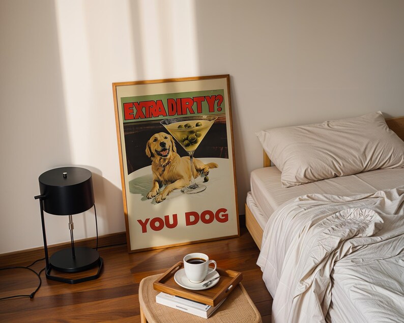 May include: A framed poster with a yellow dog and a martini glass with olives. The poster says "Extra Dirty? You Dog".