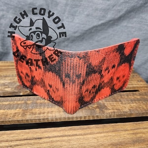 Cartera plegable de cuero cosida a mano de lujo con calaveras Walpier de Conceria