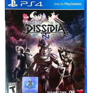 May include: A PS4 game case for "Dissidia Final Fantasy" featuring three characters in armor and holding weapons. The cover art has a dark background with the game's title in a stylized font. The case is blue with the PlayStation logo.