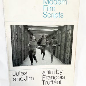 May include: A vintage paperback book titled "Modern Film Scripts" with a black and white photo of three people running. The book cover features the film title "Jules and Jim" by François Truffaut.