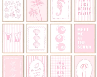 May include: A collection of framed pink art prints with beach-themed illustrations and quotes. The prints feature images of seashells, palm trees, seahorses, and the text "YOU'RE LIKE REALLY PRETTY" and "MEET ME AT THE BEACH".