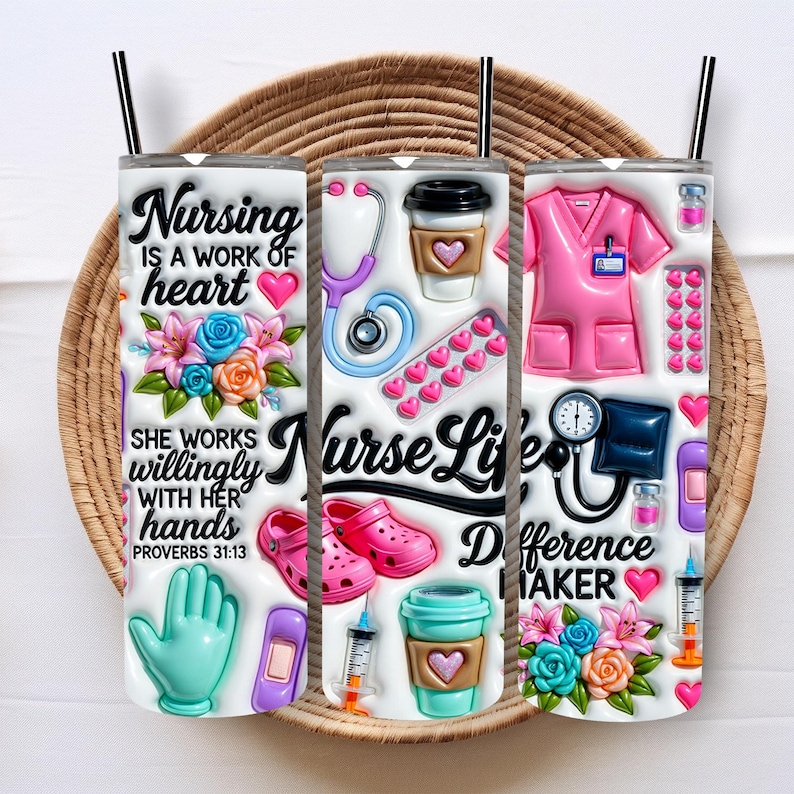 May include: Three white stainless steel tumblers with black straws, featuring nursing-themed designs. One tumbler has the text "Nursing is a work of heart" and floral accents. The other two have medical symbols and the text "Nurse Life" and "Difference Maker".
