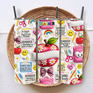 May include: Three white 20 oz. insulated tumblers with black straws, decorated with teacher-themed designs. Each tumbler features an apple, rainbows, daisies, and text like "TEACHER" and "Reminder: teaching is a work of heart."