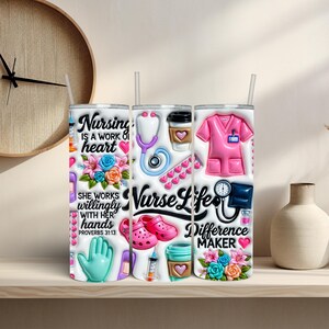 May include: Three white stainless steel tumblers with nursing-themed designs. One features text "Nursing is a work of heart", another "Nurse Life", and the third "Difference Maker". Each tumbler has a straw and is decorated with medical symbols and floral accents.