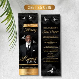 May include: A memorial bookmark with a photo of a man in a suit, the text "In Loving Memory" and "Lucas James." The bookmark is 2.5 x 8 inches, with a black background, white doves, and gold accents. The right side has a poem.