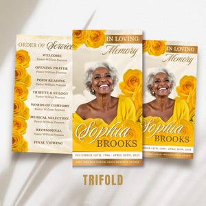May include: A trifold memorial card featuring a smiling woman in a yellow top, surrounded by yellow roses. The card reads "In Loving Memory" and includes the name "Sophia Brooks" and dates. The word "TRIFOLD" is at the bottom.