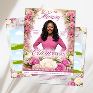 May include: A memorial card with a photo of a woman in a pink dress, surrounded by pink and white roses. The text reads "In Loving Memory" and includes dates and names. Additional cards with floral accents are visible.