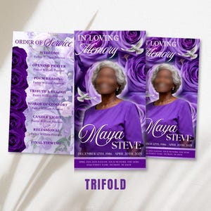 May include: A trifold funeral program template featuring deep purple roses and white doves. The design includes text such as In Loving Memory, Order of Service, and the name Maya Steve with dates. The layout displays a portrait placeholder and service details.