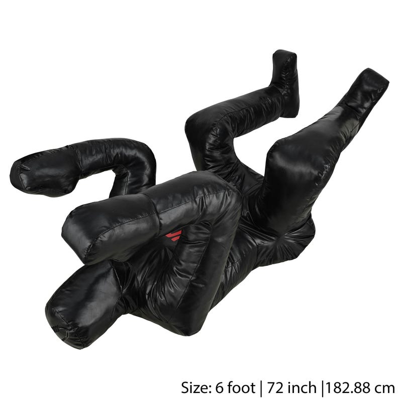 May include: Black training dummy made of padded fabric, lying on its back with arms and legs outstretched. Size: 6 foot | 72 inch | 182.88 cm