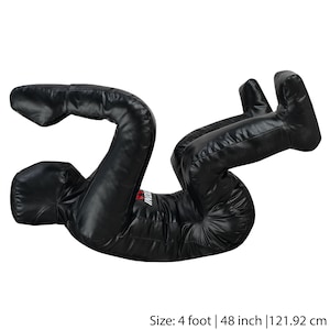 May include: Black freestanding punching bag for martial arts training. The bag is 48 inches tall and is shaped like a person in a fighting stance.