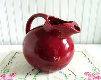 Vintage Cranberry Red Ceramic Ball Pitcher marked USA