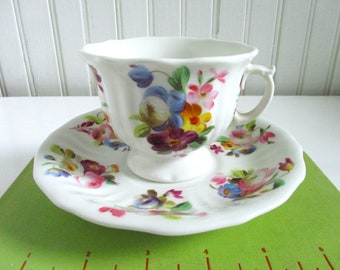 Antique SPM Hand Painted Floral Teacup and Saucer