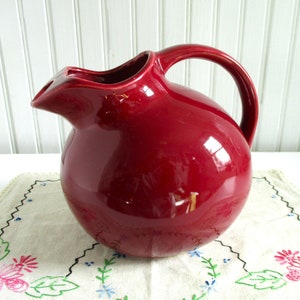 Vintage Cranberry Red Ceramic Ball Pitcher marked USA image 3