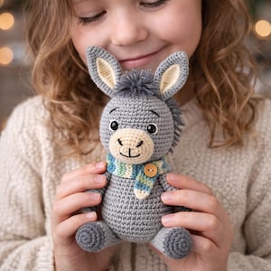 May include: A set of three ceramic mugs with a speckled, matte finish in cream, light grey, and dark grey. Each mug has a simple, minimalist design, suitable for coffee or tea.