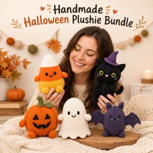 May include: A handmade Halloween plushie bundle featuring four knitted toys: a candy corn, a black cat with a purple hat, an orange jack-o'-lantern, a white ghost, and a purple bat. The text reads Handmade Halloween Plushie Bundle.