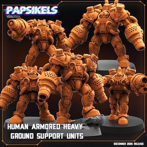 Puede incluir: Se muestran varias Unidades de Apoyo Terrestre Pesado Blindado Humano de color naranja. Las unidades tienen un diseño futurista con extremidades grandes y articuladas y accesorios de armas. El texto "Papsikels" está en la parte superior y "December 2025 Release" en la parte inferior.
