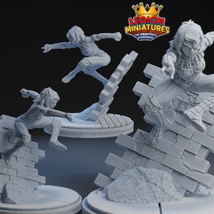 May include: Three unpainted gray resin miniature figures in dynamic leaping poses, each wearing a textured spider-web patterned suit and mask. The figures are mounted on circular bases featuring a crumbling brick wall section and debris.