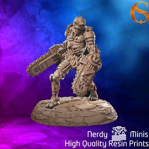 May include: A detailed miniature figure of a monstrous creature with a grotesque face and a large chainsaw in each hand. The figure is painted in a light brown color and is standing on a rocky base.