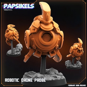 May include: Orange robotic drone probe models. The models have a detailed, mechanical design with a central circular feature. The text "Papsikels" is at the top, and "ROBOTIC DRONE PROBE" is at the bottom.