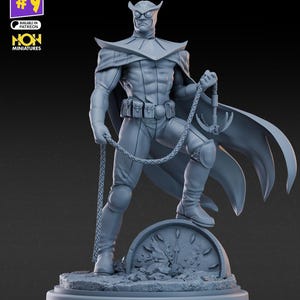 May include: A gray unpainted resin miniature figure of a masked hero wearing a cape, utility belt, and goggles, standing with one foot on a broken clock base while holding a grappling hook with a rope. Text reads JULY LINEUP #9 and NON MINIATURES.
