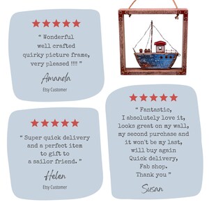 May include: A decorative wall hanging featuring a small, blue and brown wooden boat model suspended inside a square, dark brown wooden frame with a rope hanger. The image also includes three customer review text boxes with five-star ratings.