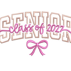 May include: A design featuring the word "SENIOR" in a tan, block-letter style, arched above the words "class of 2027" in pink script. A pink bow is centered below the text on a white background.