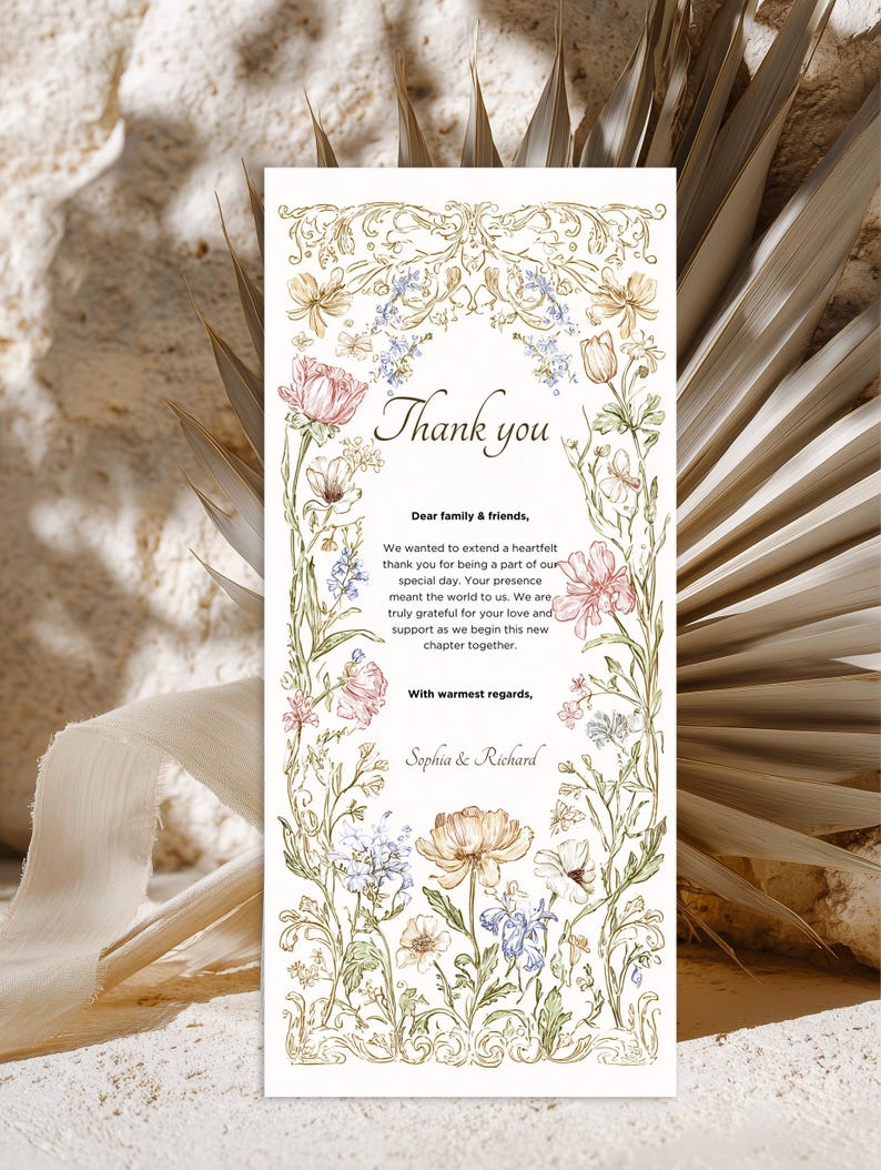 Elegant floral wedding invitation suite featuring pastel wildflowers and gold frame accents. Includes RSVP card, details card, and main invitation with botanical illustrations on a soft ivory background. Romantic and vintage-inspired design, perfect for spring or boho weddings.
