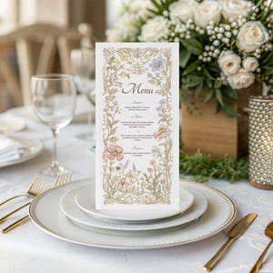 Elegant floral wedding invitation suite featuring pastel wildflowers and gold frame accents. Includes RSVP card, details card, welcome sign, thank you card, menu card, table number and main invitation with botanical illustrations on a soft ivory background. Romantic and vintage-inspired design, perfect for spring or boho weddings.
