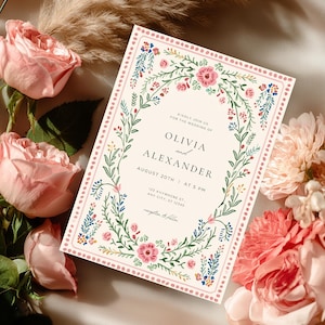 Vintage folk art floral wedding invitation template with blush dotted border and botanical frame, editable Canva printable wedding invite set.