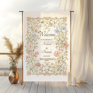 Elegant floral wedding invitation suite featuring pastel wildflowers and gold frame accents. Includes RSVP card, details card, welcome sign, thank you card, menu card, table number and main invitation with botanical illustrations on a soft ivory background. Romantic and vintage-inspired design, perfect for spring or boho weddings.