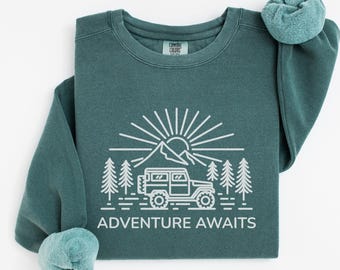Abenteuer erwartet dich – Unisex-Sweatshirt in bequemen Farben – Top-Geschenk für Outdoor-Fans und Camping-Fans