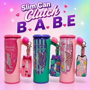 May include: Three slim can clutches in pink, teal, and pink, each holding an Alani Nu energy drink. The cans feature Pink Slush, Purple Cotton Candy, and Cotton Candy labels. Each clutch includes a matching silicone keychain with a bow design.