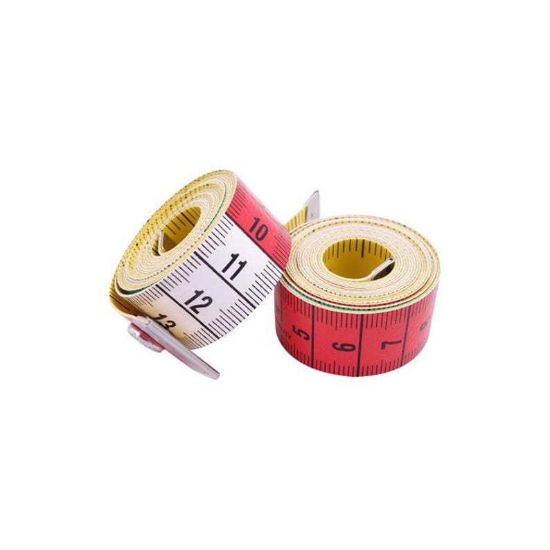 May include: Two rolled measuring tapes. One tape is red with white numbers, and the other is white with black numbers. Both tapes have yellow centers and are designed for sewing and crafting projects. The tapes are marked in inches.