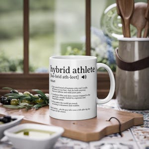Ironic Hybrid Athlete Coffee Mug Keramik Tasse Funny Gym Cup for HYROX & Functional Training Caffeine Lover Gift for Runners Lifters
