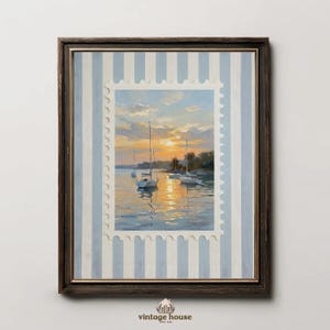 A grouped display of coastal printable wall art with several framed seaside images, including a lighthouse on rocky shore, a sailboat on still water, a sunset harbor scene, a coastal village by the sea, and a text-based nautical design reading Salt Air Adventure. The artwork uses gentle blue, cream, and soft golden tones with watercolor-style detail, creating a classic coastal grandmother mood with elegant nautical imagery and a calm, collected printable bundle look.