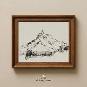 A timeless digital mountain sketch print designed for elegant, nature-inspired interiors. This printable wall art brings a calm, vintage feel to living rooms, bedrooms, offices, and cabin spaces.Vintage printable mountain wall art shown in a dark wood frame, featuring a black and white landscape sketch on a neutral background.Vintage printable mountain wall art shown in a dark wood frame, featuring a black and white landscape sketch on a neutral background.