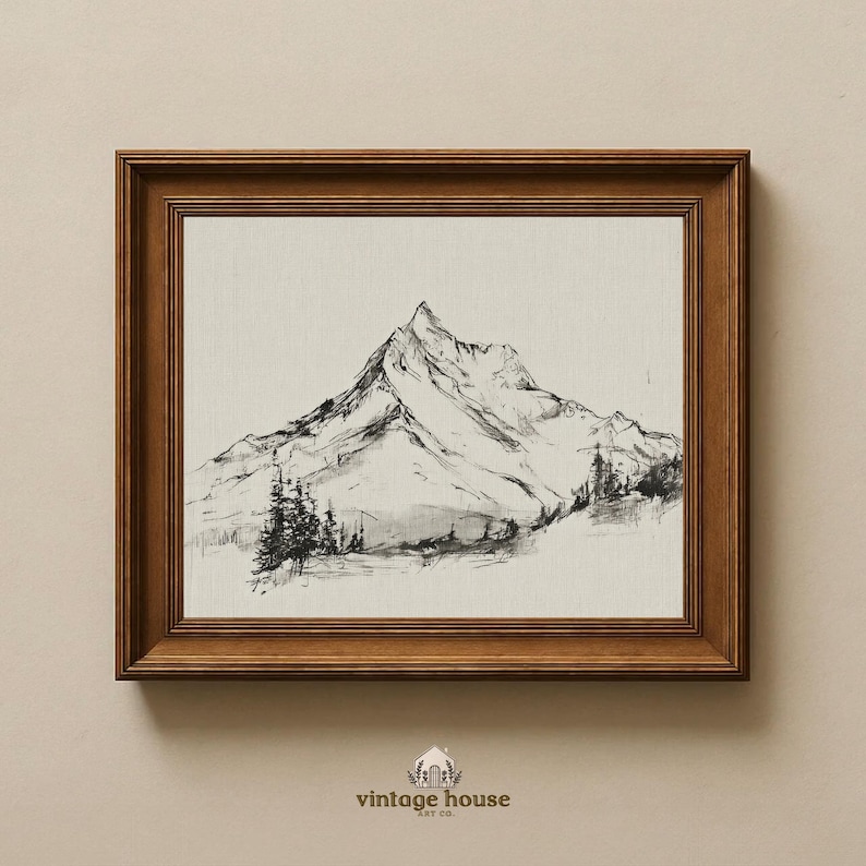 A timeless digital mountain sketch print designed for elegant, nature-inspired interiors. This printable wall art brings a calm, vintage feel to living rooms, bedrooms, offices, and cabin spaces.Vintage printable mountain wall art shown in a dark wood frame, featuring a black and white landscape sketch on a neutral background.Vintage printable mountain wall art shown in a dark wood frame, featuring a black and white landscape sketch on a neutral background.