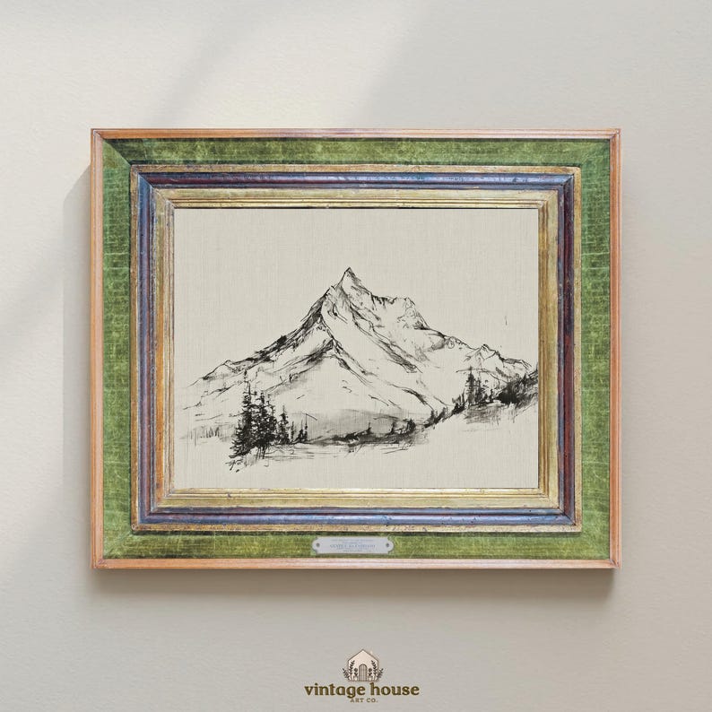 A timeless digital mountain sketch print designed for elegant, nature-inspired interiors. This printable wall art brings a calm, vintage feel to living rooms, bedrooms, offices, and cabin spaces.Vintage printable mountain wall art shown in a dark wood frame, featuring a black and white landscape sketch on a neutral background.Vintage printable mountain wall art shown in a dark wood frame, featuring a black and white landscape sketch on a neutral background.