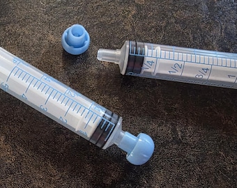 5 ml. Syringe with cap, 1 teaspoon