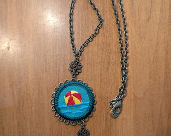 1960's girl scout swimming badge necklace