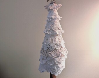 Árboles de Navidad decorados con tapetes