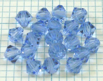 24 6mm Glass Bicone Beads - Light Sapphire