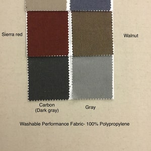 May include: Swatch cards showing 10 different fabric colors: Sand pile, Solid denim, Sierra red, Walnut, Carbon (Dark gray), Gray.  Washable Performance Fabric - 100% Polypropylene.