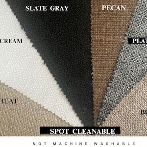 May include: A selection of fabric swatches in shades such as Whip Cream, Slate Gray, Pecan, Platinum, and Burlap. The text "SPOT CLEANABLE" is visible, with the words "NOT MACHINE WASHABLE" underneath.