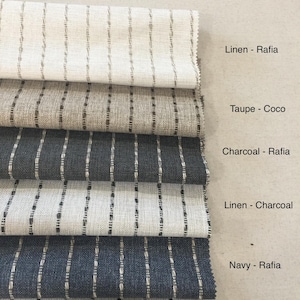 May include: Fabric samples in various colors, including linen, taupe, charcoal, and navy, with vertical stripe patterns. The text "Performance Grain Stripe" and other details are visible.