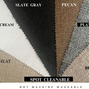 May include: A fabric swatch display featuring various colors including Whip Cream, Slate Gray, Pecan, Platinum, and Burlap. The text "Spot Cleanable" is displayed. The fabric is not machine washable.