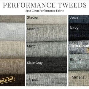 May include: A display of Performance Tweeds fabric swatches in diverse colours. The swatches include Oats, Blanco, Straw, Flax, Brown, Glacier, Marble, Mint, Slate Gray, Frost, Jean, Navy, Rain Cloud, Blue Mist, and Mineral. Some are labelled "Sold Out".