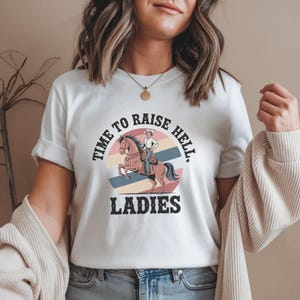 Time to Raise Hell Ladies Shirt Western Cowgirl Graphic Tee Feminist Rodeo Tee Vintage Style Western TShirt Country Girl Shirt Retro Cowgirl
