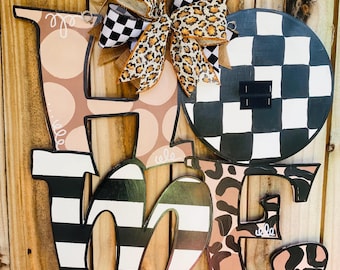 Home door hanger base for attachment / interchangeable